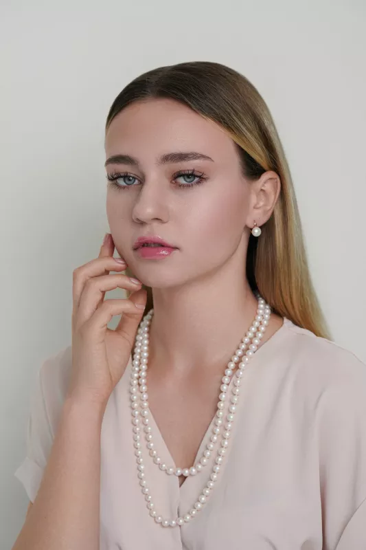 Eleganter Perlenohrring weiß button 9.5-10 mm, Zirkonia, Engl. Verschluss, Roségold 585 plattiert, Gaura Pearls, Estland Bild 4 Eleganter Perlenohrring weiß button 9.5-10 mm, Zirkonia, Engl. Verschluss, Roségold 585 plattiert, Gaura Pearls, Estland Bild 4