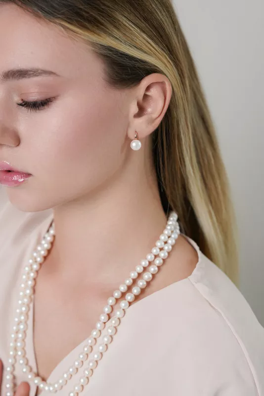 Eleganter Perlenohrring weiß button 9.5-10 mm, Zirkonia, Engl. Verschluss, Roségold 585 plattiert, Gaura Pearls, Estland Bild 1 Eleganter Perlenohrring weiß button 9.5-10 mm, Zirkonia, Engl. Verschluss, Roségold 585 plattiert, Gaura Pearls, Estland Bild 1